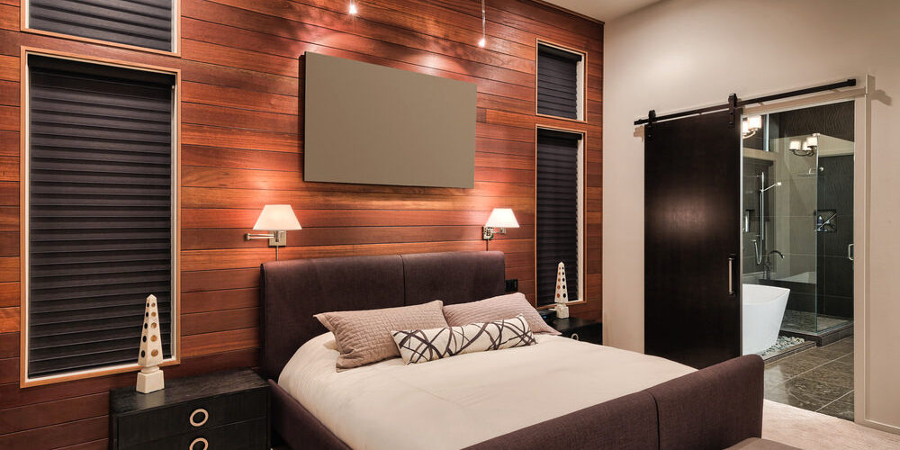 modern-master-bedroom-with-rich-wood-accent-wall-sept11